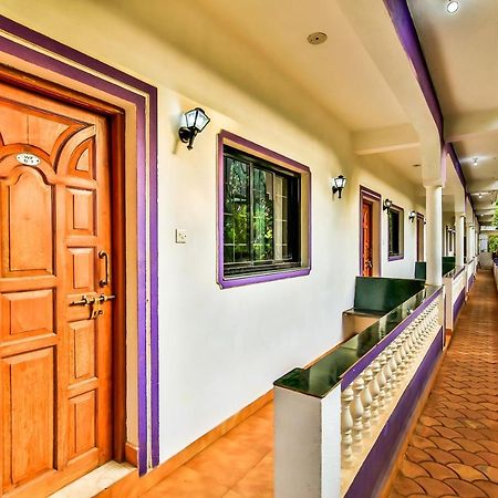Oyo 13311 The White Feather Hotel 曼德姆 外观 照片
