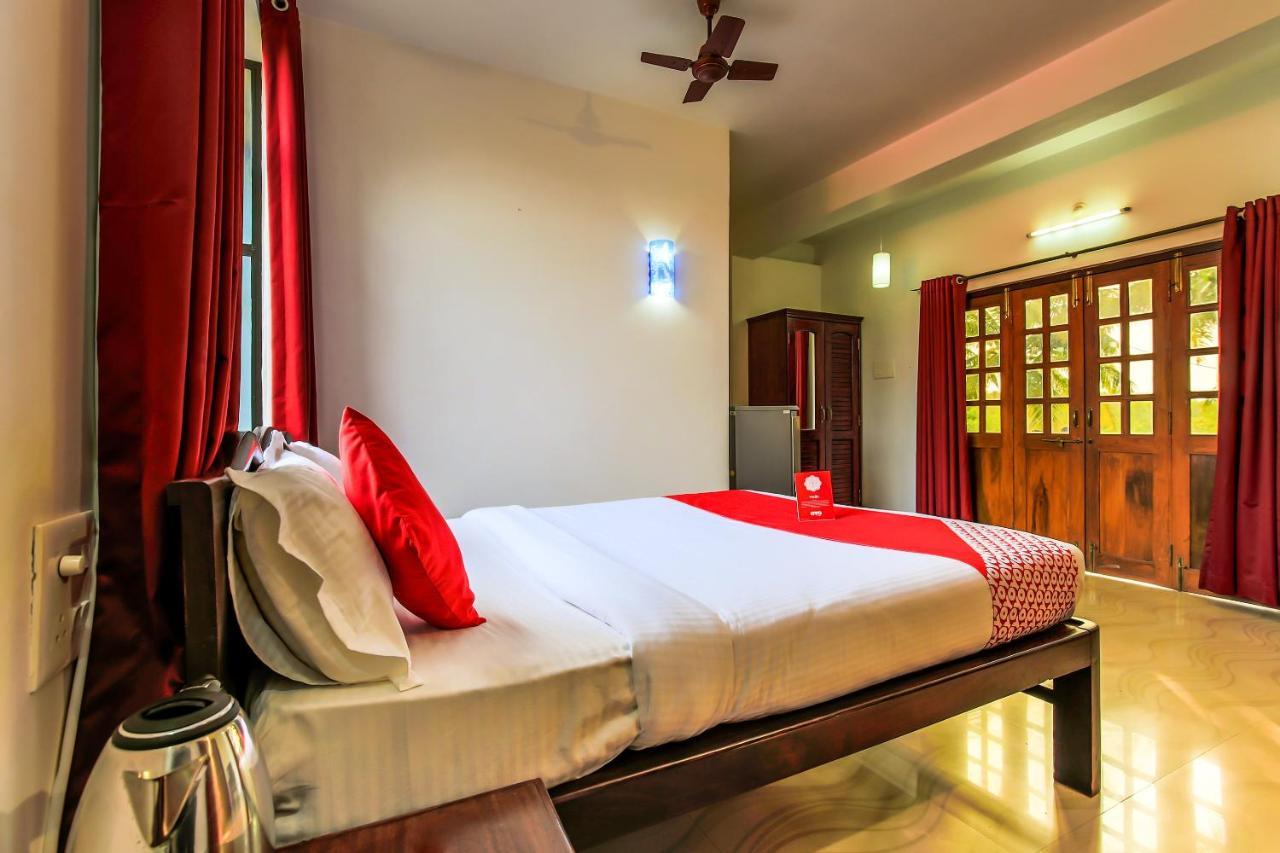 Oyo 13311 The White Feather Hotel 曼德姆 外观 照片