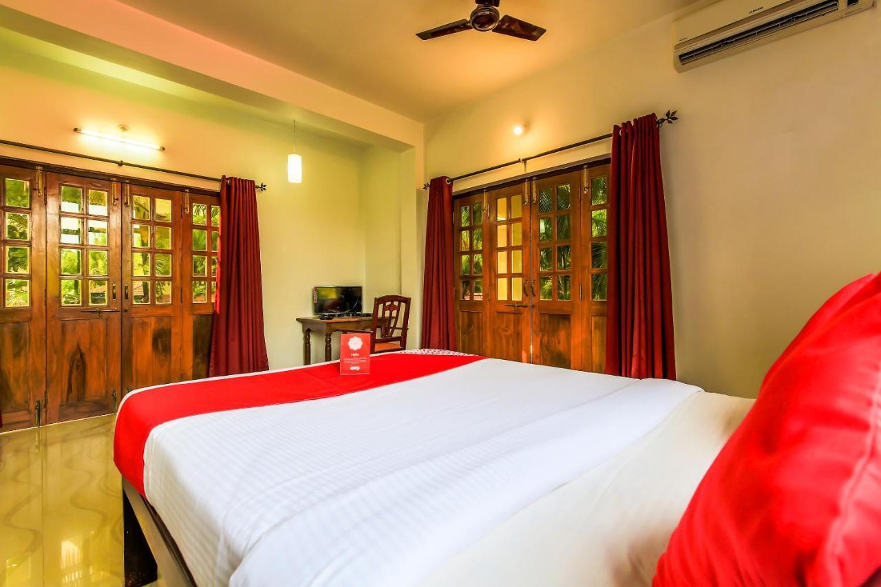 Oyo 13311 The White Feather Hotel 曼德姆 外观 照片