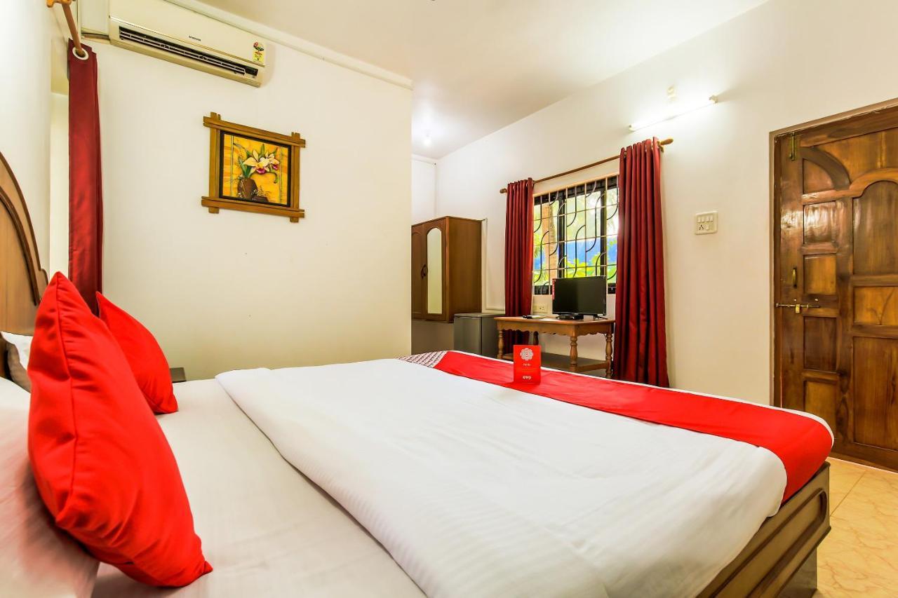 Oyo 13311 The White Feather Hotel 曼德姆 外观 照片
