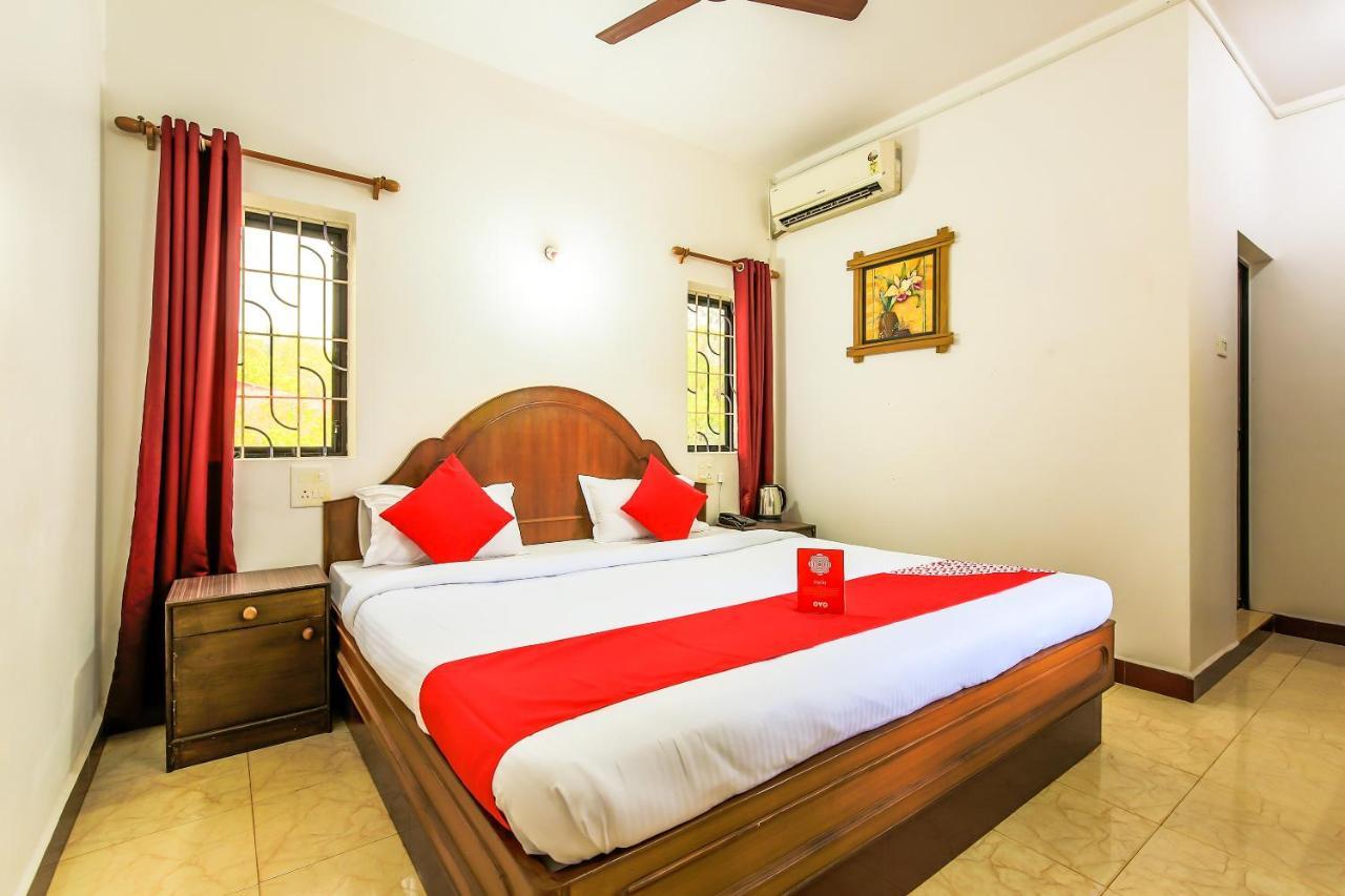 Oyo 13311 The White Feather Hotel 曼德姆 外观 照片