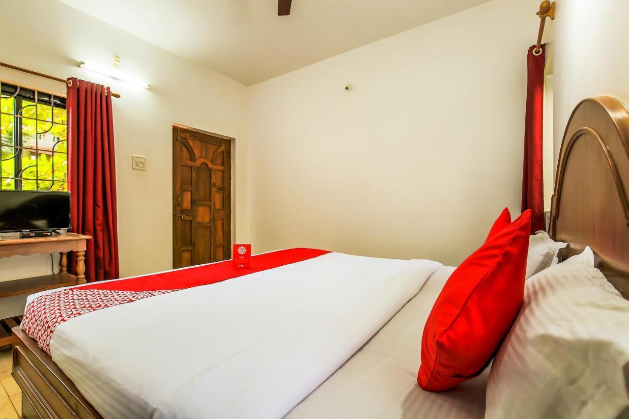 Oyo 13311 The White Feather Hotel 曼德姆 外观 照片