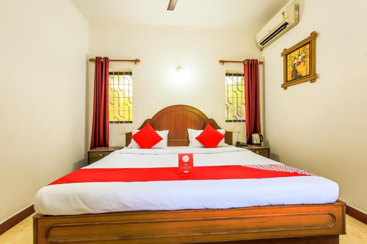 Oyo 13311 The White Feather Hotel 曼德姆 外观 照片
