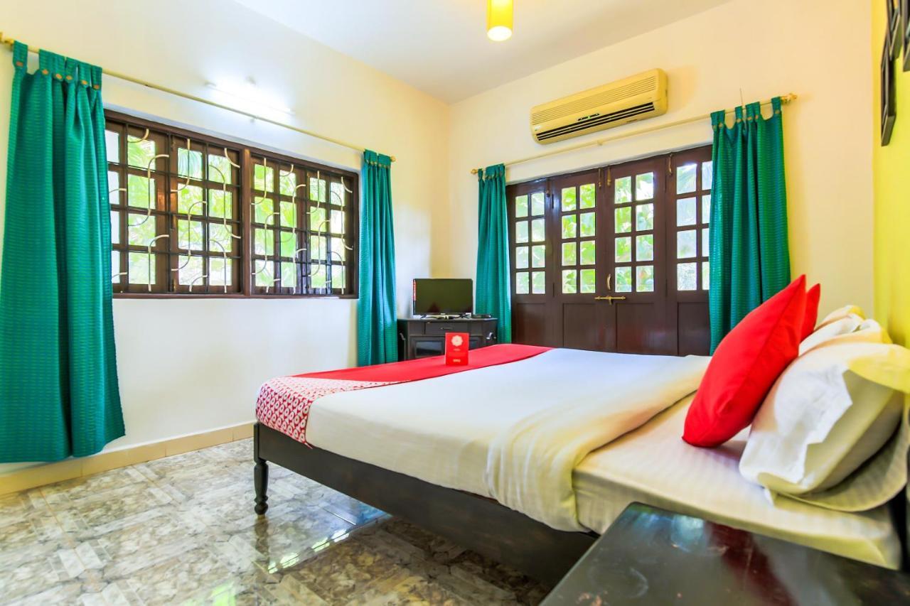 Oyo 13311 The White Feather Hotel 曼德姆 外观 照片