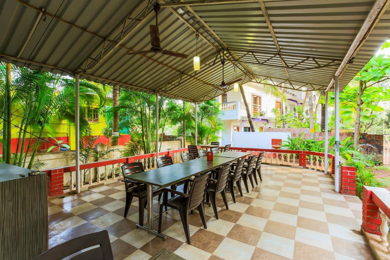 Oyo 13311 The White Feather Hotel 曼德姆 外观 照片